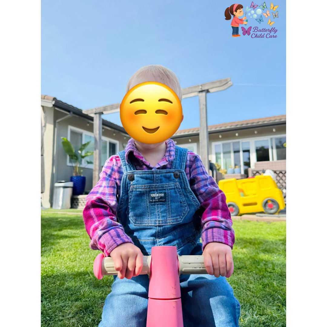 Children riding tricycles outdoors